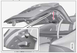 1. Open the panel on the inside of the trunk lid.