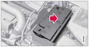 2. Move the battery inward and to the side until it reaches the rear edge of