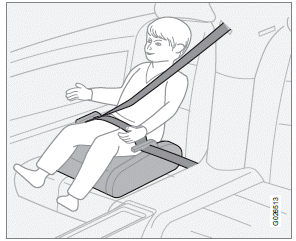 Position the child correctly on the booster cushion